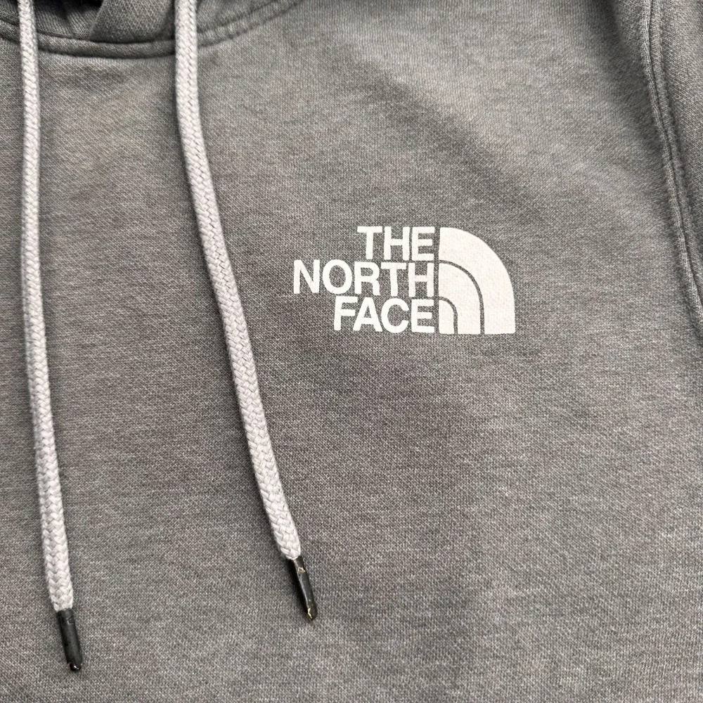 The North Face M‎ Grey Hoodie Camouflage Logo Print Never Stop Exploring Graphic
